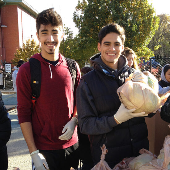 Two UIC students volunteering