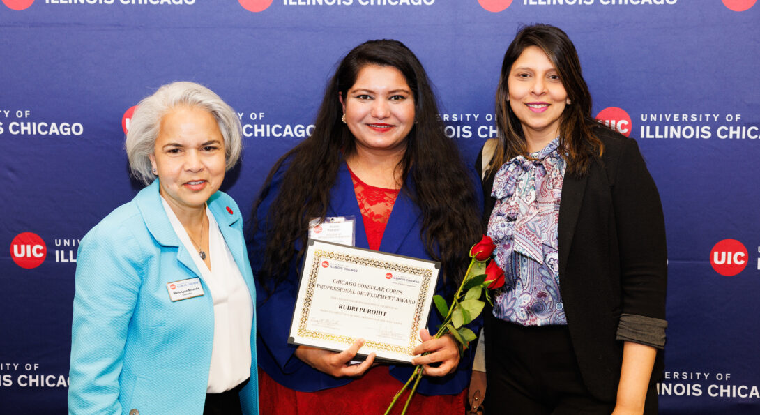 From left to right: UIC chancellor Marie Lynn Miranda, Rudri Purohit and Tanvi Bhatt at the UIC  at the Awards Ceremony.