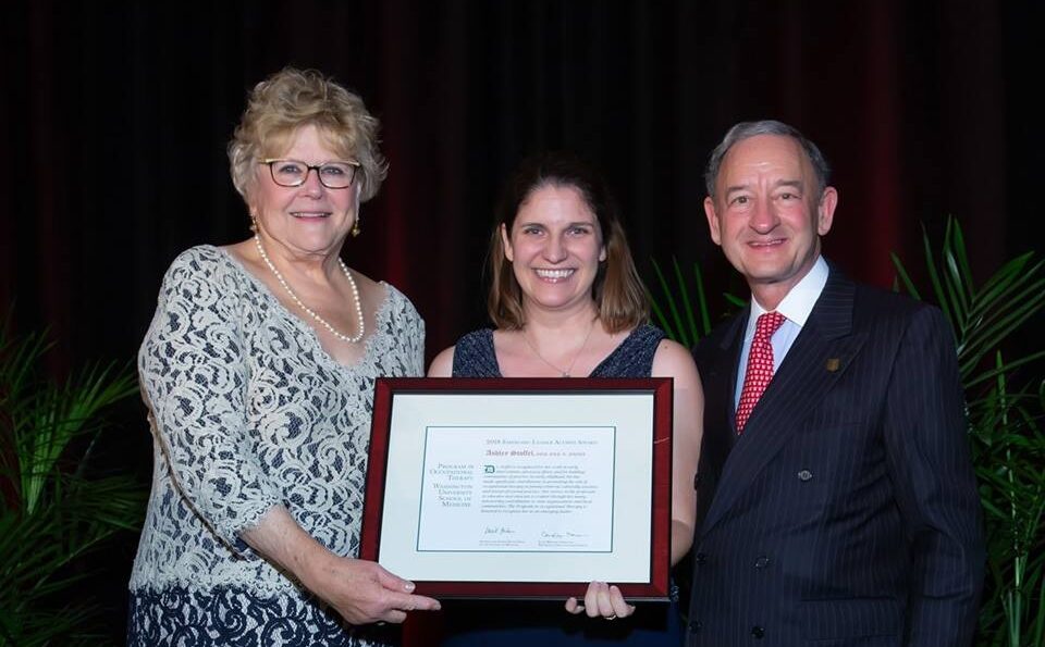 photo is of the Washington University in St. Louis Chancellor, Mark S. Wrighton, Ashley Stoffel, and the Program in Occupational Therapy Elias Michael Program Director, M. Carolyn Baum.