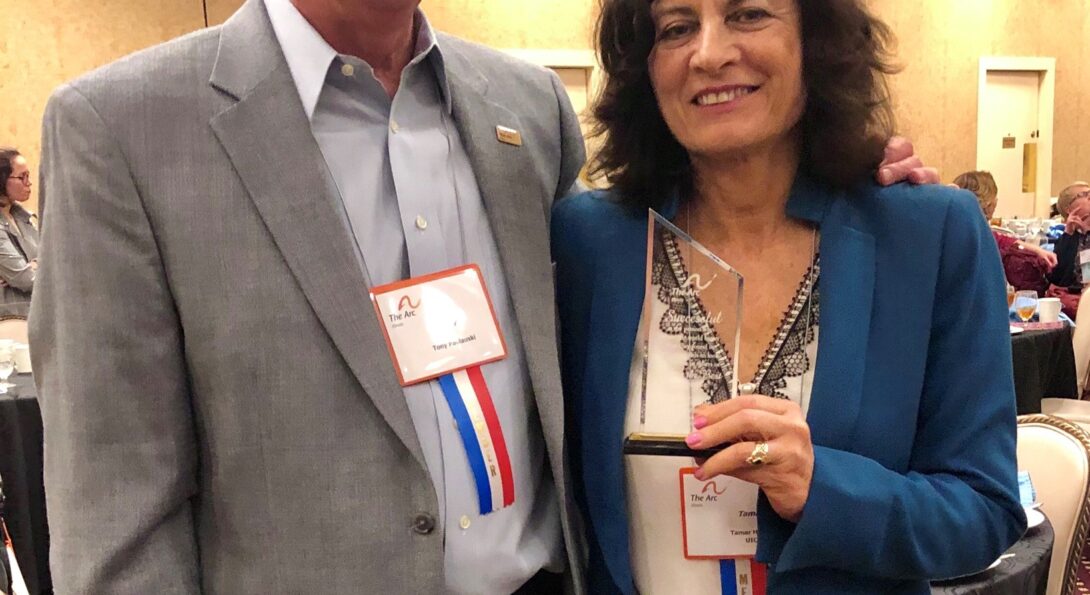 Tamar Heller is pictured with Tony Paulauski, the award’s namesake, and former Executive Director of the Arc of Illinois.