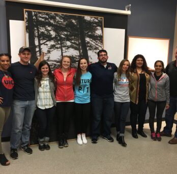 Eight UIC kinesiology students with professor John Coumbe-Lilley and program coordinator Kristina Jackson
                  