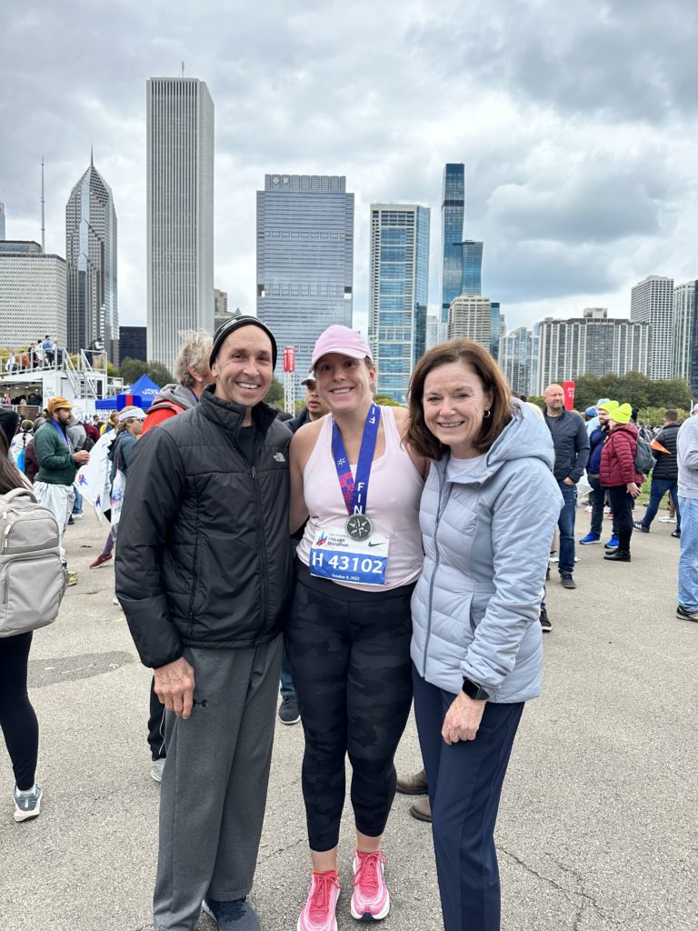 KN instructor Annmarie Chizewski celebrates with her parents, Larry and Barbara Chizewski, after she completed the 2023 Chicago Marathon. It was her second marathon, and she vows it won’t be her last.