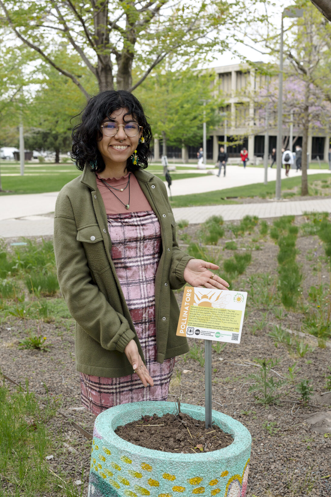 Eyzel Torres-Vicencio showing a sign she designed