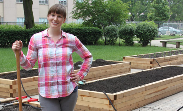 Woman in UIC nutrition garden