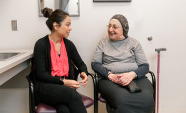 Two women sitting and talking