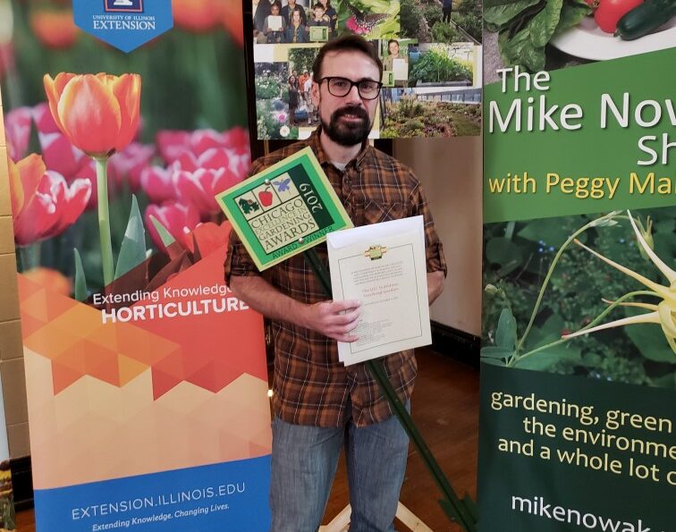 James “Danny” John ‘18 MS KINES stands with the award certificate