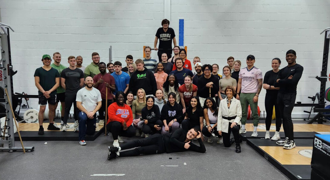 After an advance strengthening and conditioning collaborative session with ARU and UIC students and faculty, including Vered Arbel (kneeling far right), kinesiology graduate chaperone Kiyah Reed (center) and ARU lecturer Mike Ferrandino (kneeling left).