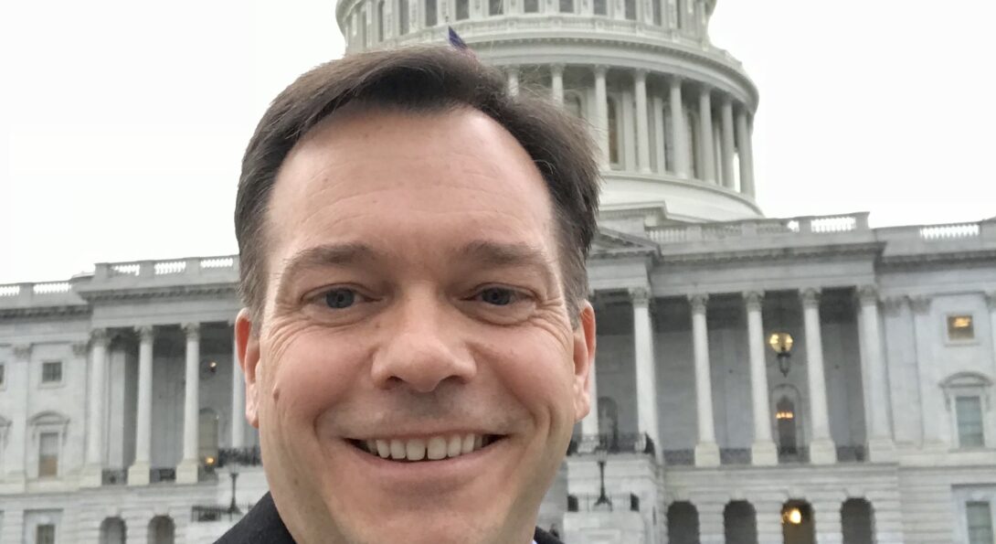 Joe Caldwell in front of the US Capitol Building