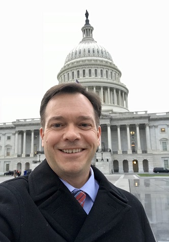 Joe Caldwell in front of the US Capitol Building