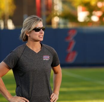 Lynn Curylo looks on the softball field
                  