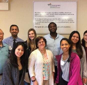 A group of UIC medical students in the DHD-family medicine program pose in the lobby of UCP Seguin with Maureen Gecht Silver (center, family medicine) and Kiyoshi Yamaki (left, DHD), who are in charge of the program.
                  