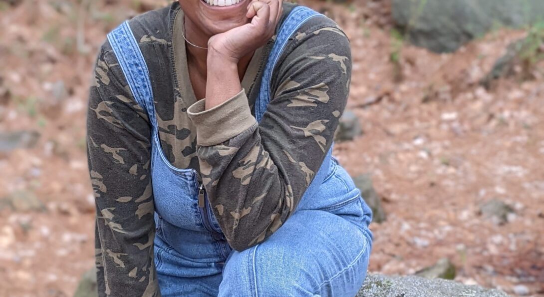 Khorizon Dunn sits on a large boulder