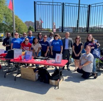 AHS students, alumni, faculty and staff pose for a group photo during the 2022 AHS fall kick-off event for new undergraduate students
                  