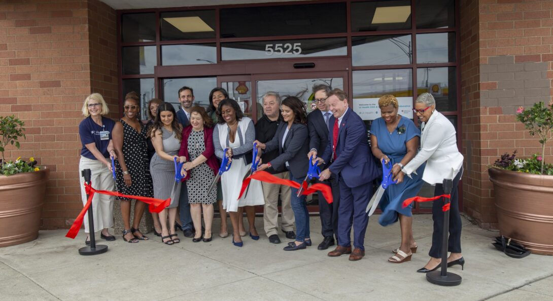 UIC leaders celebrate the 55th & Pulaski Health Collaborative, a comprehensive clinical care center at 5525 S. Pulaski Road, with partners at a ribbon-cutting ceremony May 20, 2022.