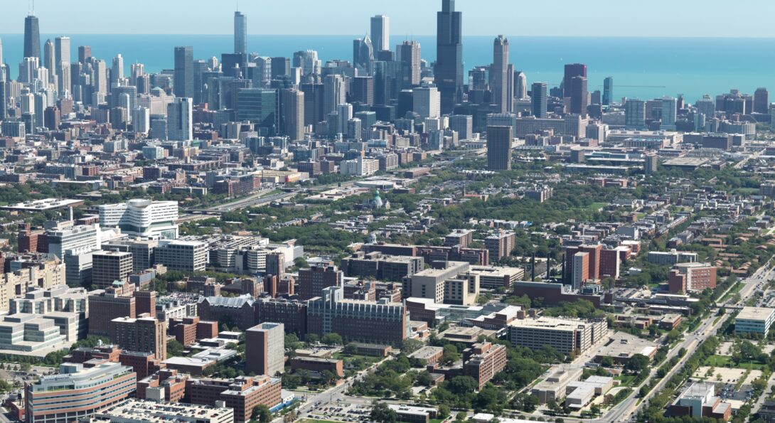 Aerial view of the UIC west campus with the Chicago skyline and Lake Michigan in the background