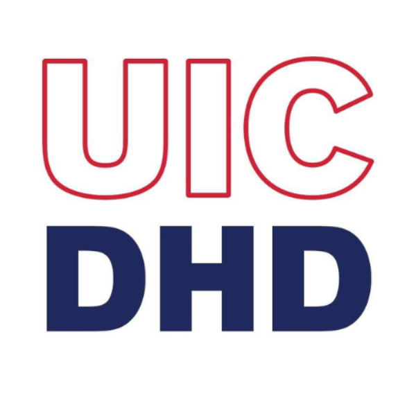 Shanita Jones smiling at the camera in formal attire.