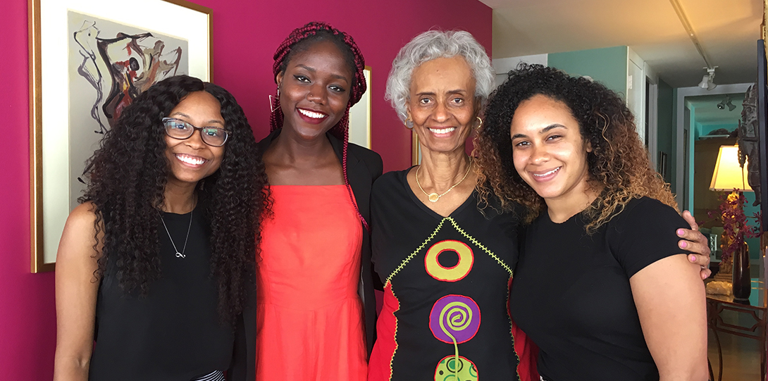 A group of women smiling at the camera